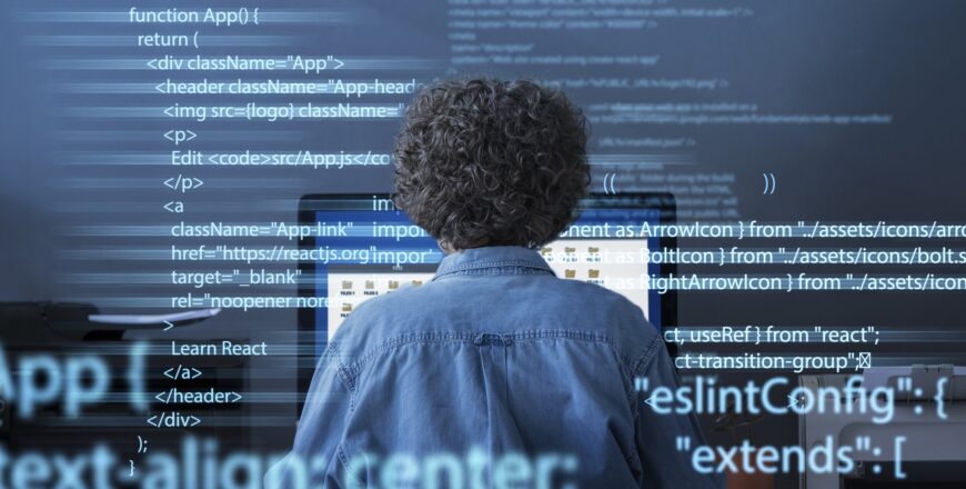 programming-background-with-person-working-with-codes-computer (1).jpg